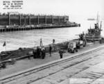 USS S-43 at the Bethlehem shipyard in San Francisco, California, United States, 26 Jan 1944; note floating dry dock at the opposite pier