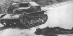 Injured Polish tanker beside his TKS tankette, Poland, Sep 1939