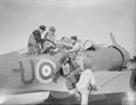 N-3PB aircraft of No. 330 (Norwegian) Squadron RAF being used to transport a sick civilian woman, Reykjavik, Iceland, May 1942