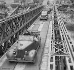 Winston Churchill, Bernard Montgomery, and Miles Dempsey crossing the Orne River in Caen, France during Churchill’s inspection tour, 22 Jul 1944. This bridge was thereafter known as “The Winston Bridge.”