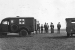 Medical units of the 306th Bomb Group at RAF Thurleigh in Bedfordshire, England stand ready as the bombers return from a mission to enemy territory, 1943-44.