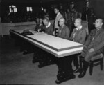 Yasuji Okamura signing the surrender document, Nanjing, China, 9 Sep 1945, photo 1 of 2