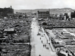 Structures on either side of Kencho Dori in ruins, Okayama, Japan, Aug 1945; the area in lower right corner of the photograph was the Okayama Women