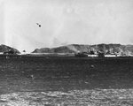 Spectacular photo showing the moment a VT Proximity Fuze detonated a 5-inch shell nearly in the face of an attacking pilot, 29 Apr 1945, Kerama Retto near Okinawa, Japan. The ship is seaplane tender USS St. George.