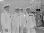 Rear Admiral Gerard Mansfield (left), Admiral John Cunningham (center), and King George VI of the United Kingdom (right) inspecting HMS Orion, Naples, Italy, 10 Jul 1944