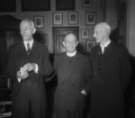 Martin Niemöller (center) with fellow religious leaders M. N. W. Smitvoors and P. Kaetske meeting at the Grote Kert in Haarlem, The Netherlands, 27 May 1952