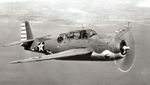 Grumman TBF-1C Avenger in flight, Jan-May 1942, location unknown. Photo 1 of 2.