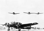 Blenheim Mark I bomber of No. 62 Squadron RAF and Buffalo fighters of Nos. 21 and 453 Squadrons RAAF on the ground, Sembawang, Singapore, late 1941, photo 2 of 2