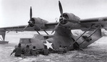 US Navy personnel freeing a PBY-5A Catalina aircraft from frozen waters in the Aleutian Islands at Kodiak Bay, US Territory of Alaska, May 1942-Jan 1943