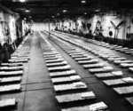 Hangar bay of HMS Colossus while on repatriation duty, Jinsen Prisoner of War Camp, Inchon, Korea, Sep 1945