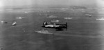 F4U-4B Corsair fighter of US Navy squadron VF-113 in flight over USS Missouri, Inchon, Korea, 2 Oct 1950, photo 2 of 2