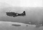 SBD Dauntless dive bomber of US Marine Corps VMSB-144 squadron flying near Cape Torokina and Empress Augusta Bay, Bougainville, Solomon Islands, 1 Nov 1943