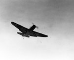 TBD-1 Devastator torpedo bomber of Torpedo Squadron 6 in flight over carrier Enterprise in landing pattern, as indicated by the down arrestor hook and wheel, 29 Jul 1941