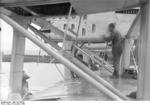 German maintenance crew in the wing area of the Do X aircraft, Amsterdam, the Netherlands, Nov 1930