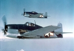 F6F-3 Hellcat fighters in flight, 21 Jun 1943; note tricolor camouflage