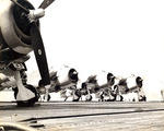 F6F Hellcat fighters of Fighting Squadron 6 warming up aboard USS Intrepid, 1944, photo 2 of 2