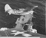 Helldiver aircraft over Hornet, South China Sea, mid-Jan 1945, photo 2 of 2