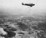 Spanish Nationalist Air Force Ju 52/3m aircraft dropping bombs during the Spanish Civil War, 1936-1939