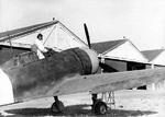 Re.2000 Falco I fighter of the Italian 377th Squadron at rest at an airfield, 1940s