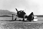 Re.2000 Falco I fighter of the Italian 377th Squadron at rest at an airfield, 1940s