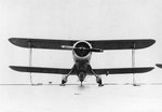 SOC-3A Seagull floatplane of US Navy Scouting Squadron 201 (VS-201) parked on the deck of escort carrier Long Island, 16 Dec 1941, photo 2 of 3