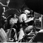 B-29 Superfortress bomber crew members inside their aircraft, 1945