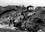 Three Japanese Type A-class midget submarines wrecked by demolition charges, at a former Japanese base on Kiska Island, Aleutian Islands, 7 Sep 1943, photo 2 of 2