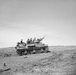 British Priest self-propelled gun in action, Anzio, Italy, 31 Jan 1944