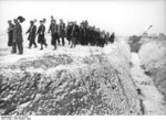 German women marching out of Berlin, Germany to dig defensive fortifications, Feb-Mar 1945