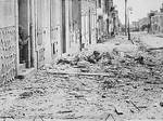 US Army soldiers fighting in the streets of Brest, France during the mop up operations, Sep 1944