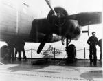 B-25 bomber on the aft flight deck of USS Hornet, Apr 1942; note USS Gwin in background