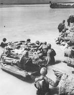 Casualties evacuated by rubber boat, Betio, Tarawa Atoll, 21 Nov 1943