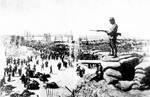 A Japanese soldier oversaw Chinese laborers in the rebuilding of Yellow River dikes, Henan, China, circa mid- or late-1938