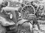 Japanese Type 95 Kurokane scout car being bogged down by the flood caused by intentional opening of Yellow River dikes by Chinese troops, Shou County, Anhui Province, China, 17 Jun 1938