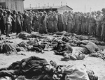 Dwight Eisenhower inspecting Ohrdruf Concentration Camp, Thuringia, Germany, 12 Apr 1945; note George Patton in crowd about a quarter of the way from the left of the photograph