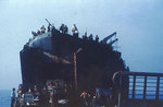 LST-1 landing US Army jeeps onto a beach near Salerno, Italy, Sep 1943