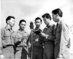 Japanese-American soldiers of US 442nd Regimental Combat Team singing 