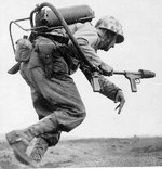 Man of US 9th Marines with flamethrower, Motoyama Airfield (Airfield Number 2), Iwo Jima, Feb 1945