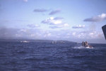 LVTs off Iwo Jima with cruiser Vincennes and a Fletcher-class destroyer in background, 19 Feb 1945