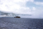 American transport USS Barrow making smoke screen during a rehearsal landing for Iwo Jima invasion, late 1944 or early 1945