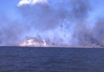 Large explosion at the northern base of Mount Suribachi, probably during the pre-landing bombardment of Iwo Jima, 19 Feb 1945