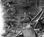 Three Japanese soldiers emerged from their hiding place to surrender, Iwo Jima, 5 Apr 1945