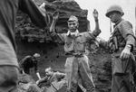 Japanese troops being captured by Americans on Iwo Jima, Japan, 5 Apr 1945