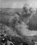 US Marine sealing the entrance of a Japanese tunnel on Mount Suribachi, Iwo Jima, Japan, 25 Feb 1945