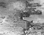 Landing ships and craft unloading on Iwo Jima