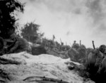 African-American US Marines awaiting orders shortly after landing on Saipan, Mariana Islands, 16 Jun 1944