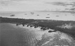 American transports unloading supplies at Morotai, Sep 1944, photo 2 of 2