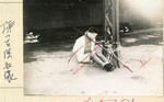 Chinese civilian bounded up at a train marshaling yard, Tianjin, China, Jul-Aug 1937; note Japanese censor