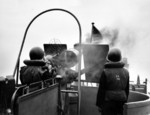 Firing an anti-aircraft machine gun off Normandy, France, Jun 1944