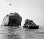 LST unloading a Cromwell tank onto Sword beach, Normandy, France, 7 Jun 1944